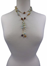 Load image into Gallery viewer, Necklace Length:45" Long. Major Beads/material: Amazonite; larimar; hematite. Color: Blue. Findings: NA. Clasp: NA. Workmanship: Exquisite workmanship with double knotting over each stone in natural colored mixed cotton thread. Feature(s): Bohemian-chic wrap necklace is embellished with larimar and amazonite stones. Versatile length. Tie it in a knot, wrap it around waist or loop it around neck and leave the ends loose. Many ways to wear this necklace.