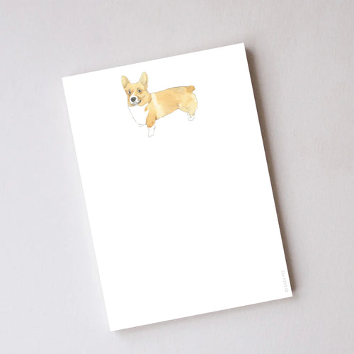 Corgi Notepad- 5 inches by 7 inches - 100 sheets, tear at top - Stiff chipboard backing - Individually wrapped - Printed using certified wind power