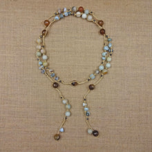 Load image into Gallery viewer, Necklace Length:45&quot; Long. Major Beads/material: Amazonite; larimar; hematite. Color: Blue. Findings: NA. Clasp: NA. Workmanship: Exquisite workmanship with double knotting over each stone in natural colored mixed cotton thread. Feature(s): Bohemian-chic wrap necklace is embellished with larimar and amazonite stones. Versatile length. Tie it in a knot, wrap it around waist or loop it around neck and leave the ends loose. Many ways to wear this necklace.
